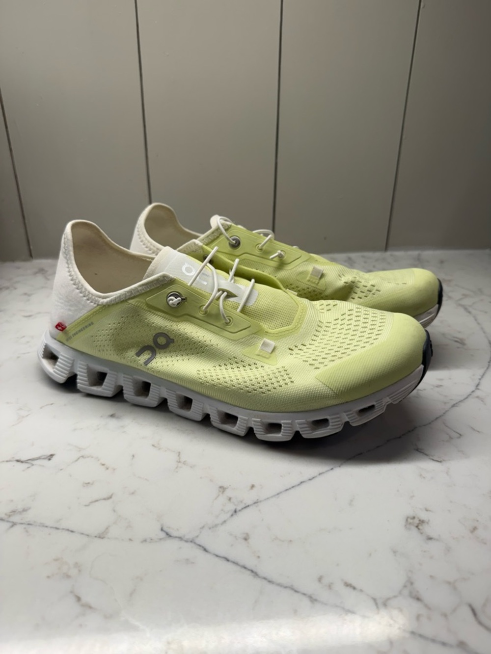 On Cloud Running Shoes in Light Green and White